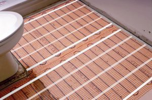 heated floor, warmth, bathroom, basement, mud room, radiant floor heating, underfloor heating, hydronic floor heating, comfort, heat, homeowner, tile, concrete, conductor, energy, temperature, renovation, warm floor, shower, remodel