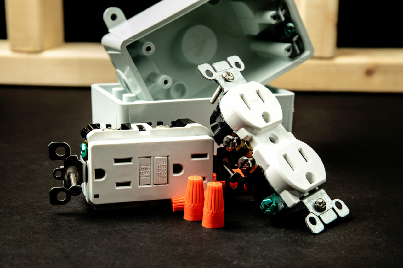 A standard 15 amp duplex outlet and a ground fault circuit