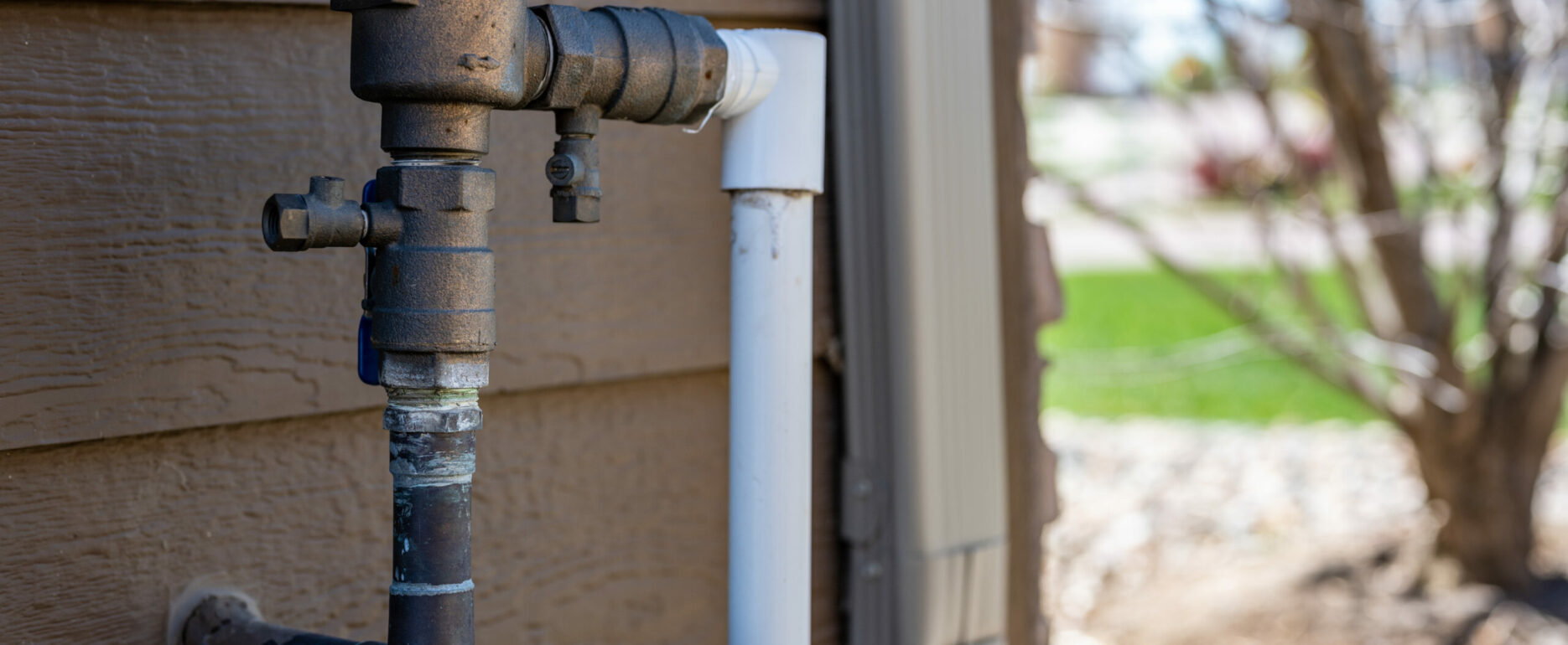 Test cocks, shut off valves, and vacuum breaker to a lawn sprinkler irrigation system
