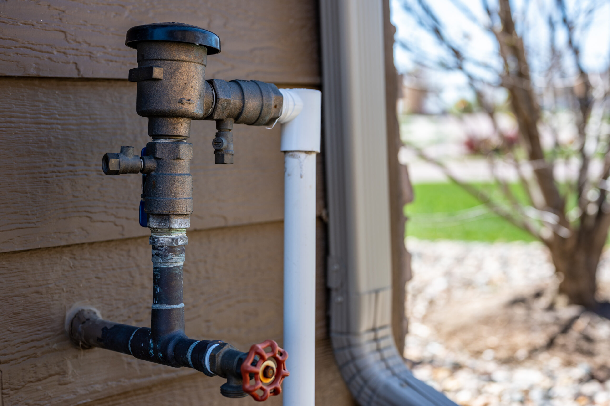 Test cocks, shut off valves, and vacuum breaker to a lawn sprinkler irrigation system