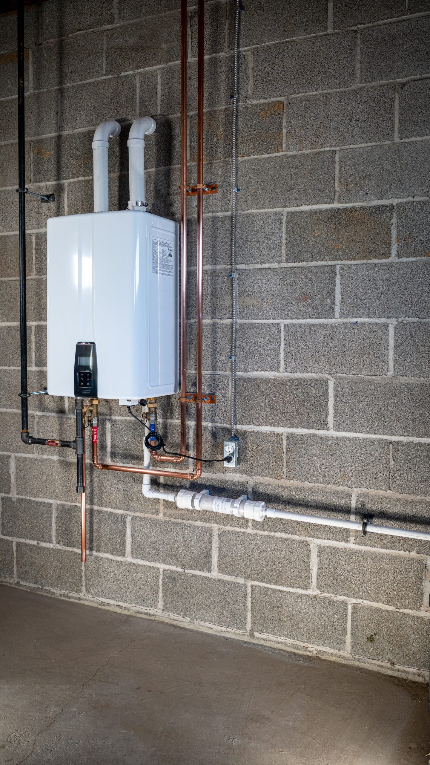 Installation of a tankless water heater.