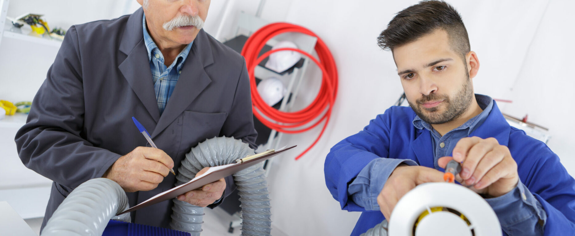 young apprentice technician with his instructor
